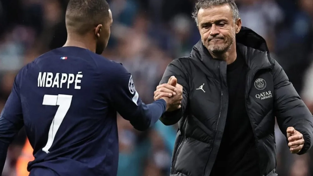 Kylian Mbappé y Luis Enrique.