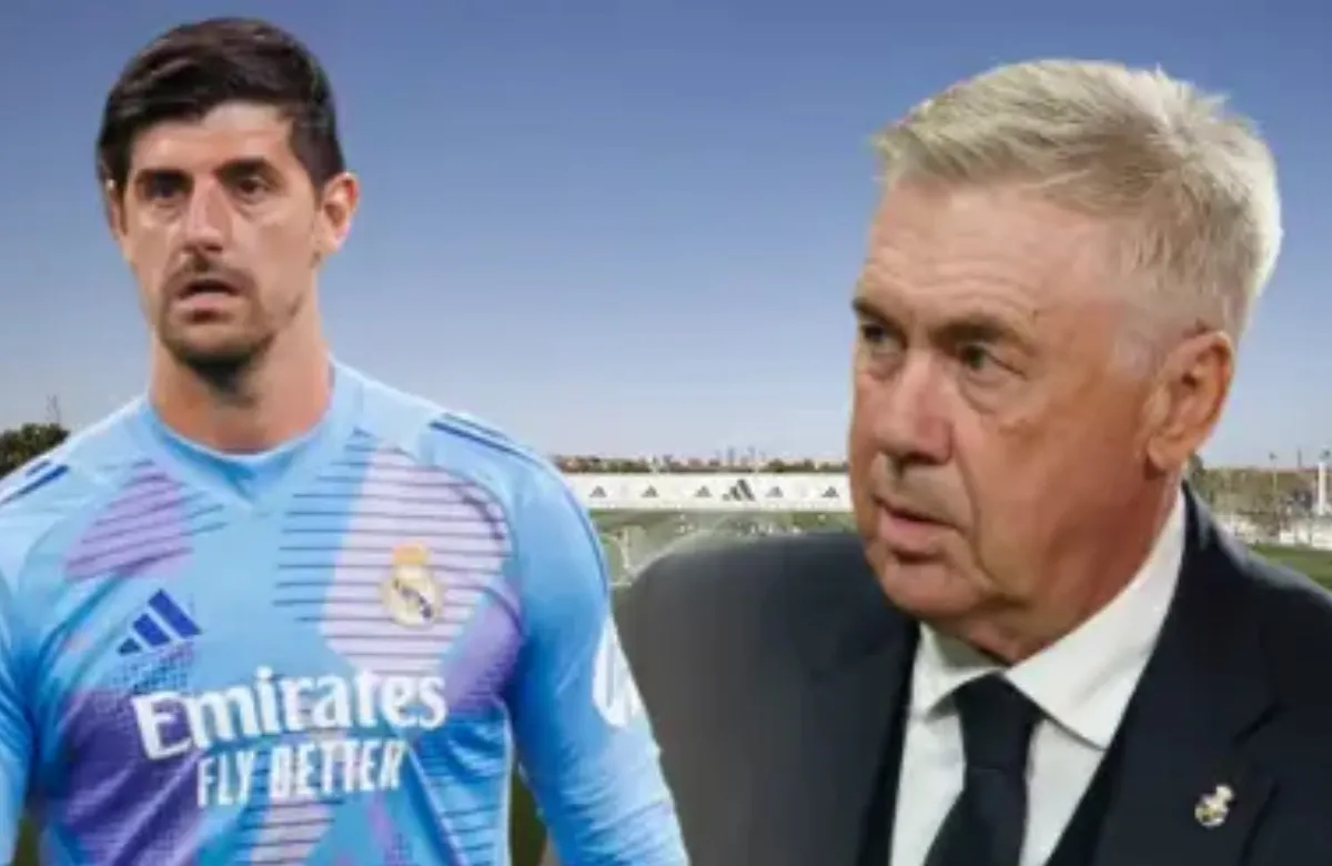 Thibaut Courtois y Carlo Ancelotti.