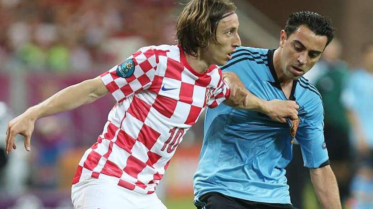Modric y Xavi