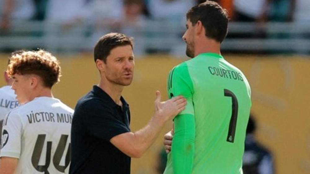 Courtois y Xabi Alonso Courtois y Xabi Alonso