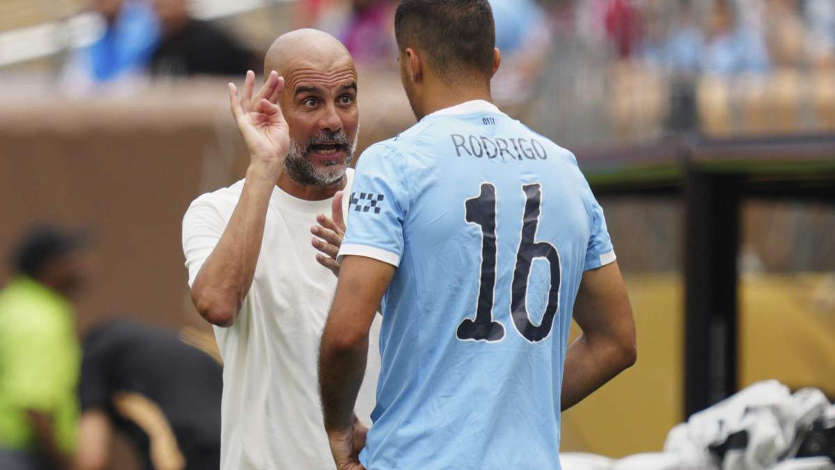 Pep Guardiola y Rodri Pep Guardiola y Rodri
