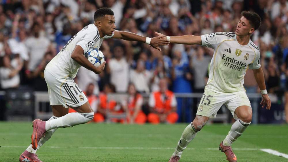 Kylian Mbappé, junto a Arda Güler, celebra uno de sus goles contra el Marsella en la Champions. Kylian Mbappé, junto a Arda Güler, celebra uno de sus goles contra el Marsella en la Champions.
