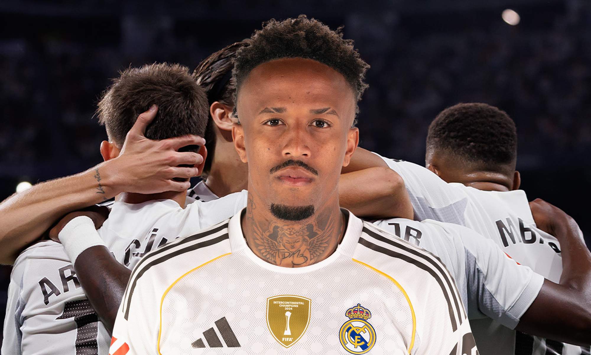 Eder Militao y jugadores del Real Madrid celebrando un gol. 