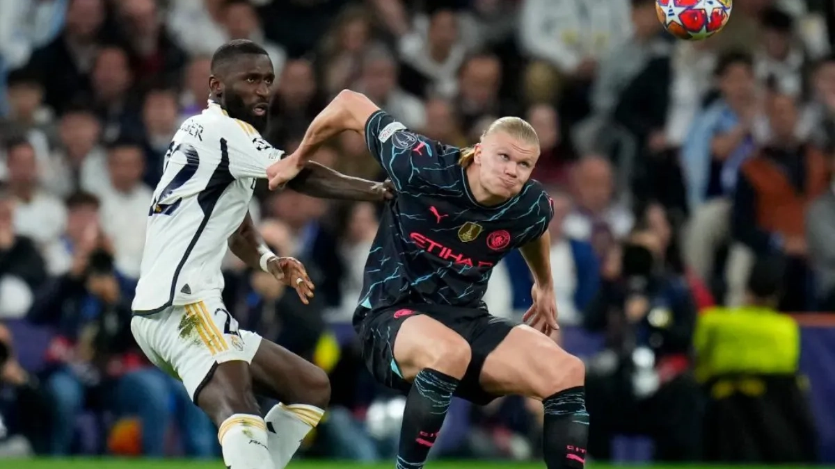 Rüdiger defendiendo a Haaland en un Real Madrid Manchester City