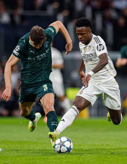 Vinícius Júnior y Ruben Días durante el Real Madrid - Manchester City. Vinícius Júnior y Ruben Días durante el Real Madrid - Manchester City.