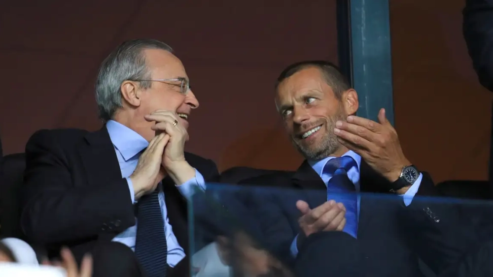 Florentino Pérez y Ceferín teniendo una charla. Florentino Pérez y Ceferín teniendo una charla.