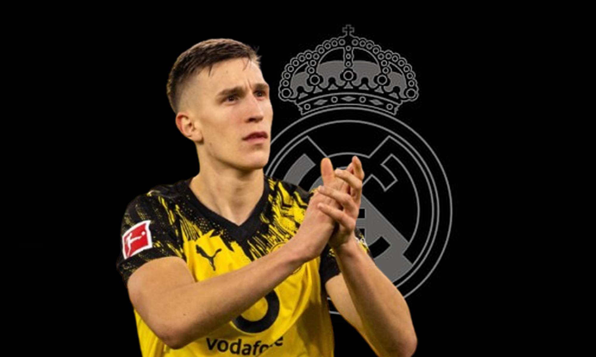 Schlotterbeck con la camiseta del Dortmund y un wallpaper del Real Madrid. 