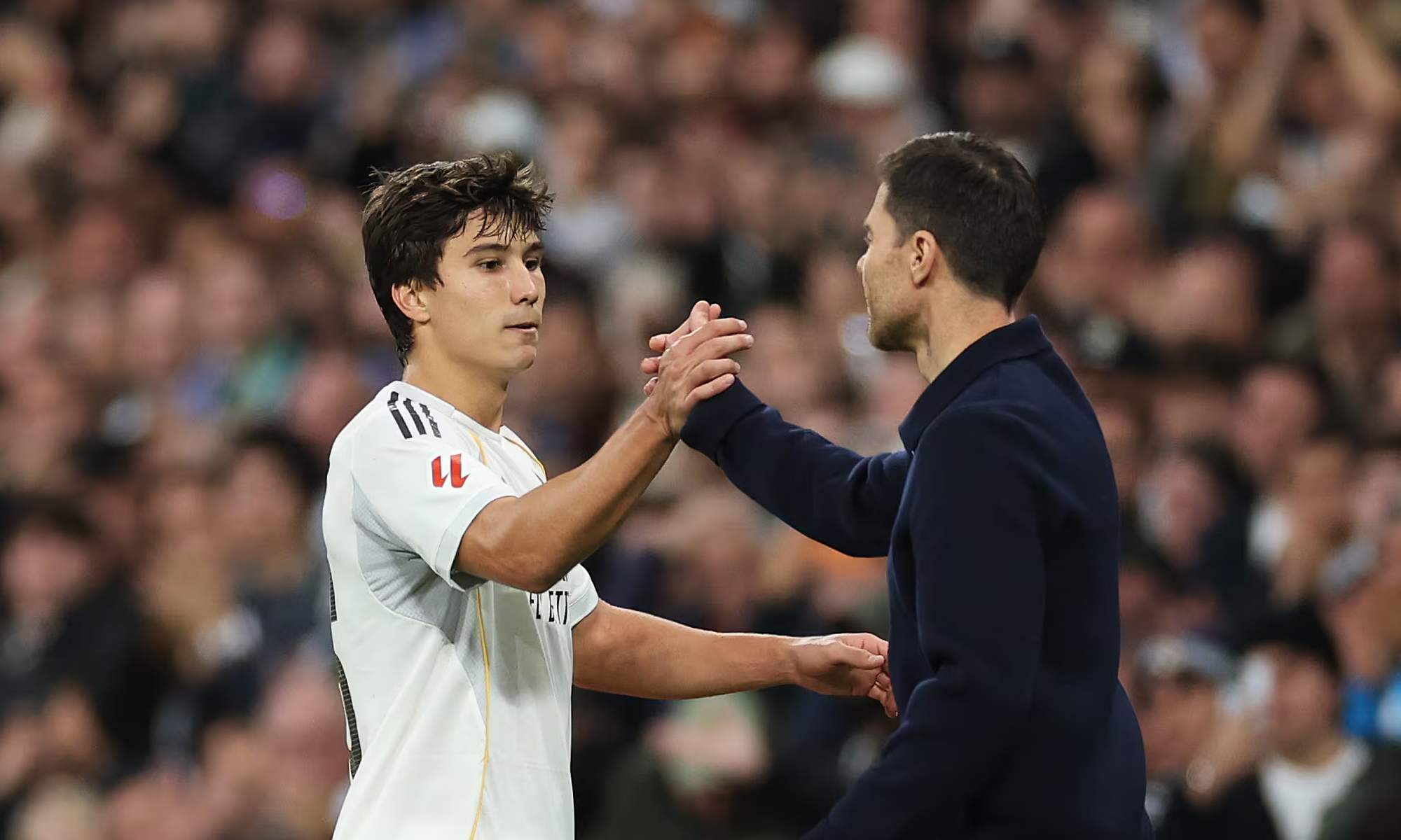 Xabi Alonso y Gonzalo García en un partido del Real Madrid.