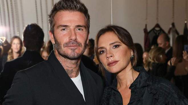 David y Victoria Beckham en un desfile