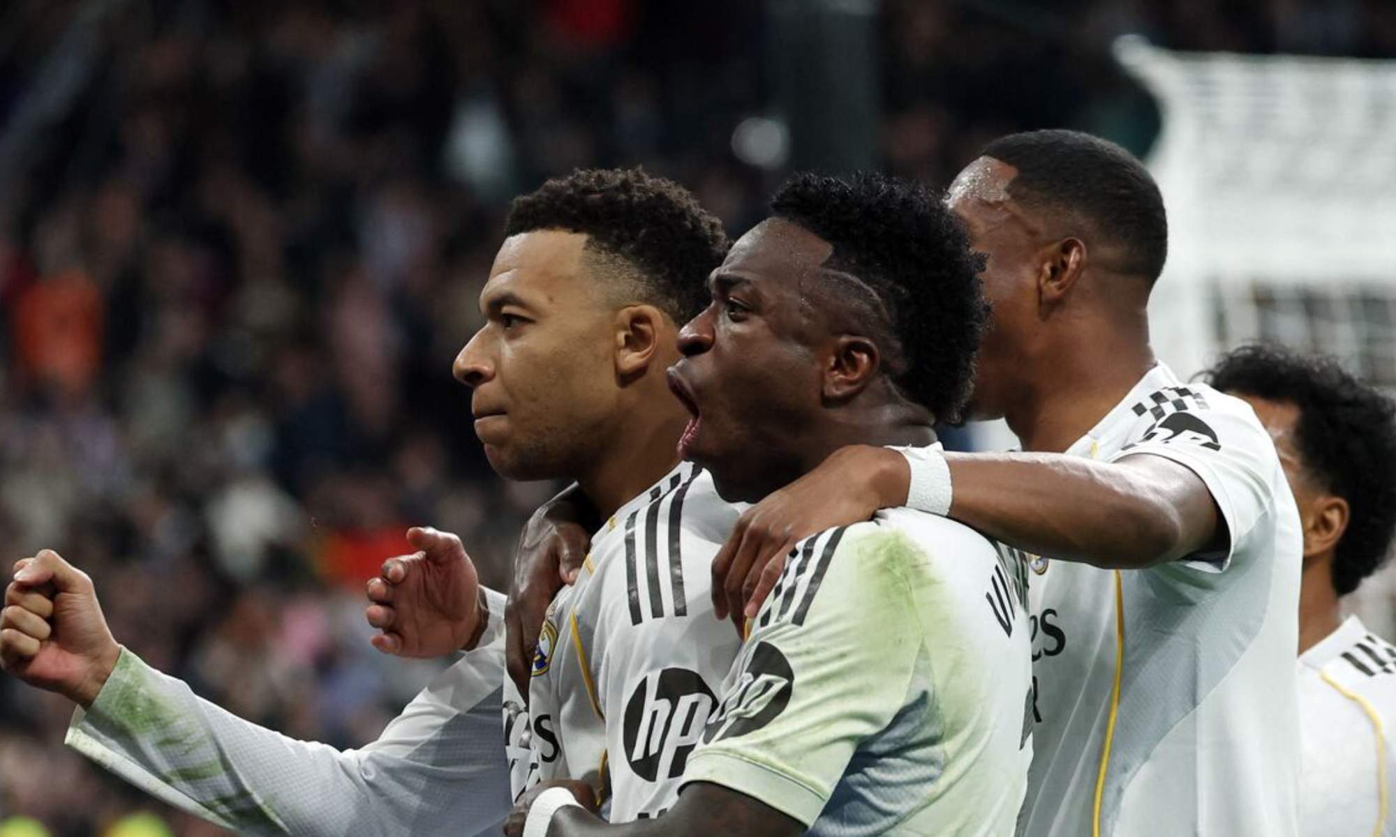 Kylian Mbappé celebra, con Vinicius Junior y David Alaba, el gol de la victoria ante el Rayo Vallecano. Kylian Mbappé celebra, con Vinicius Junior y David Alaba, el gol de la victoria ante el Rayo Vallecano.
