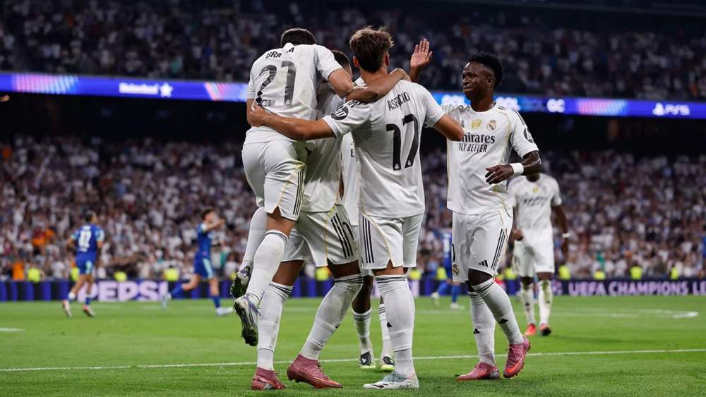 Algunos futbolistas del Real Madrid, celebrando un gol en Champions.