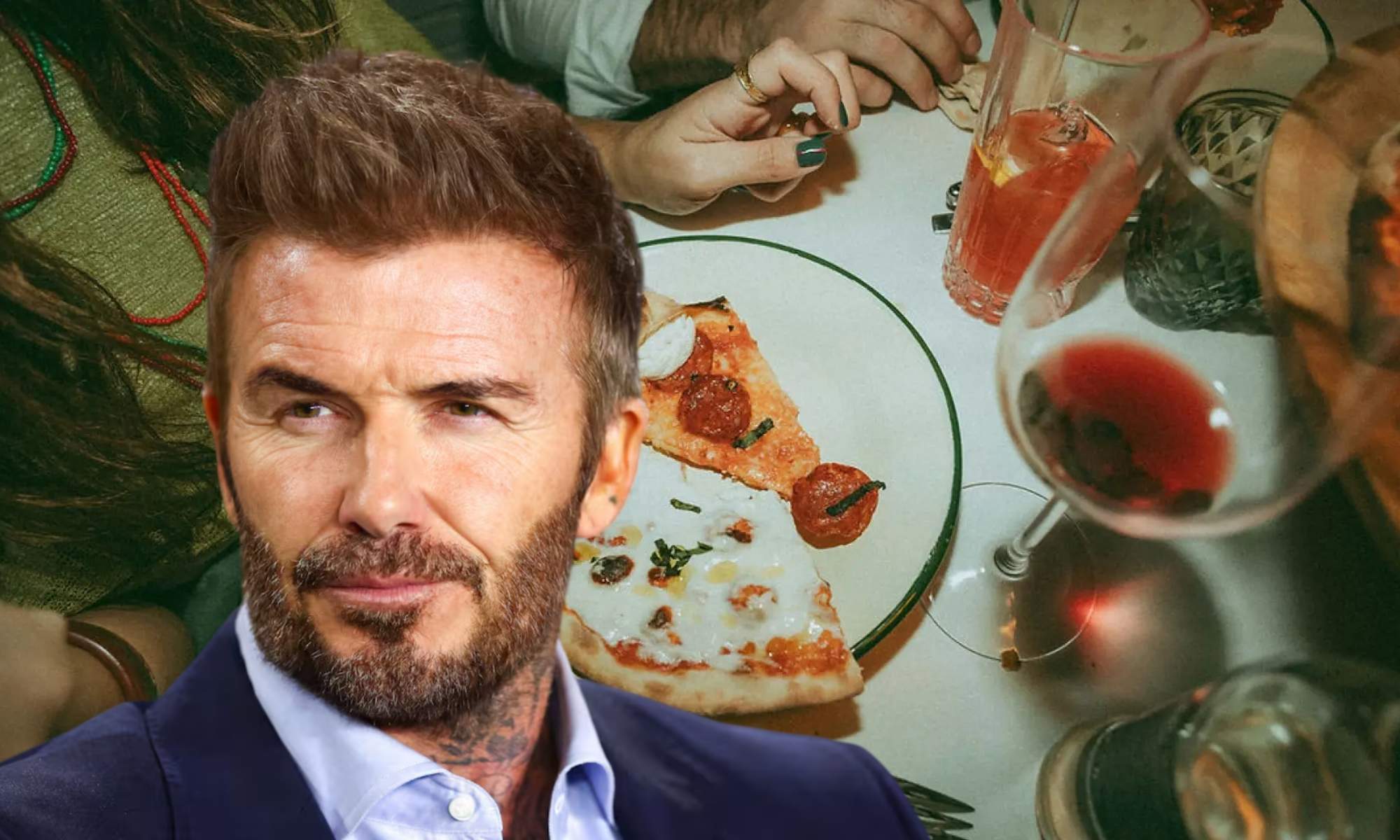David Beckham tiene una pizza en un restaurante madrileño.