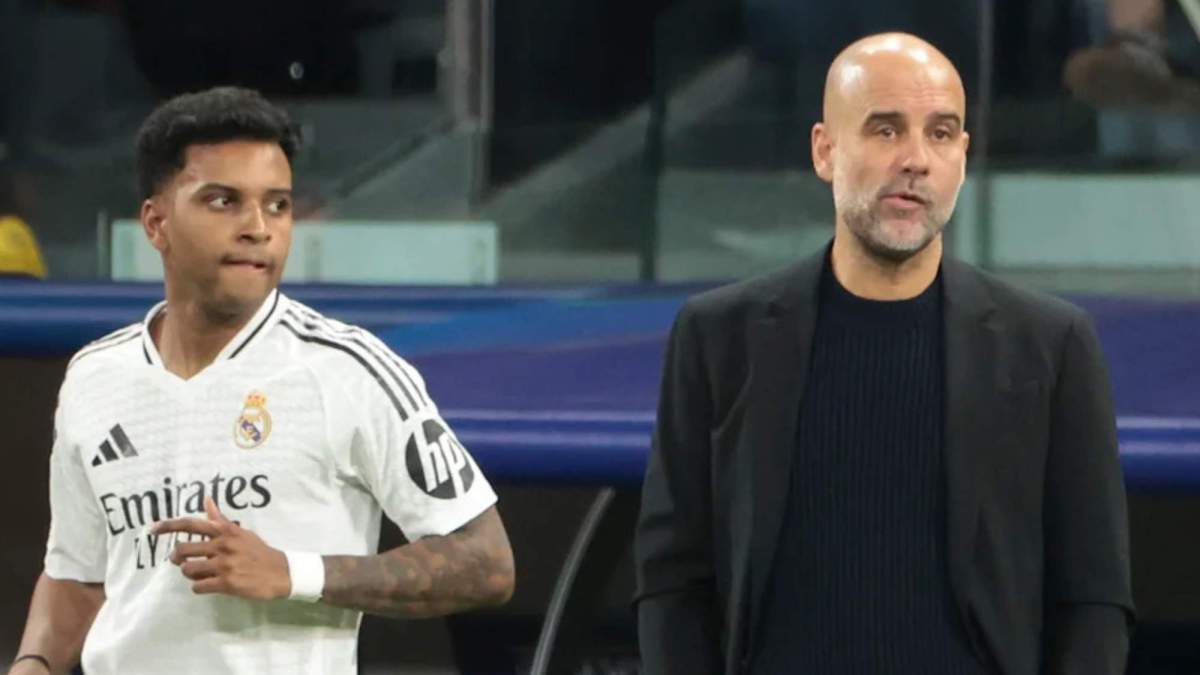 Guardiola y Rodrygo Goes durante un Real Madrid Manchester City