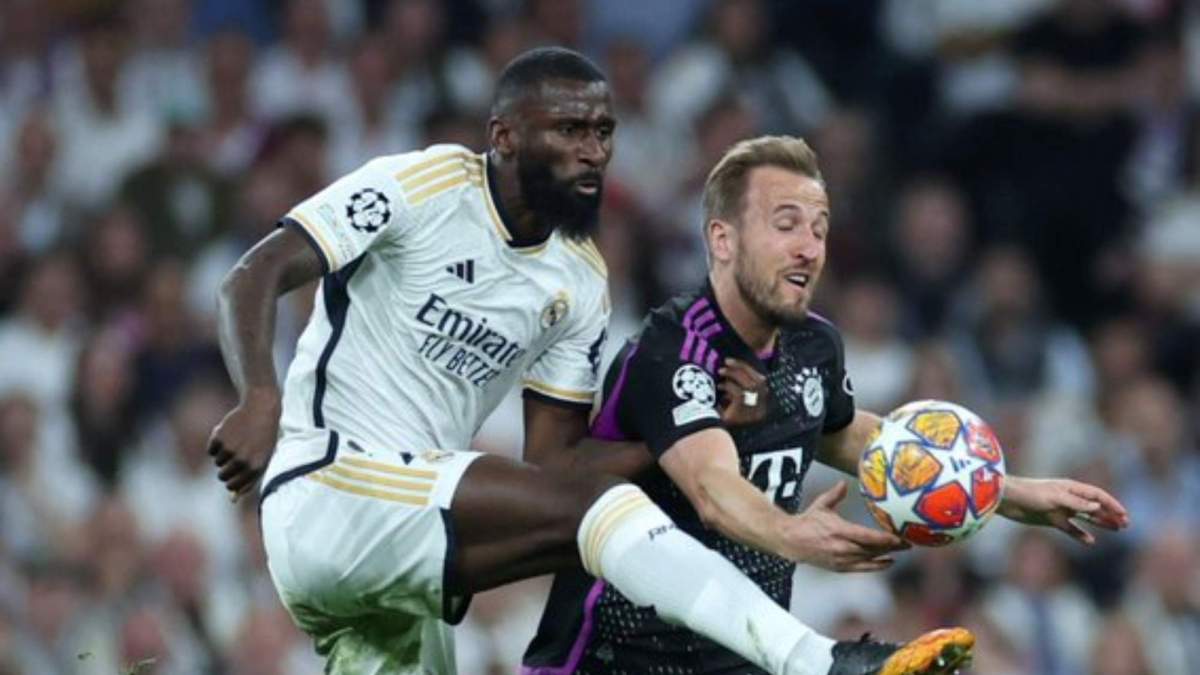 Rüdiger y Harry Kane