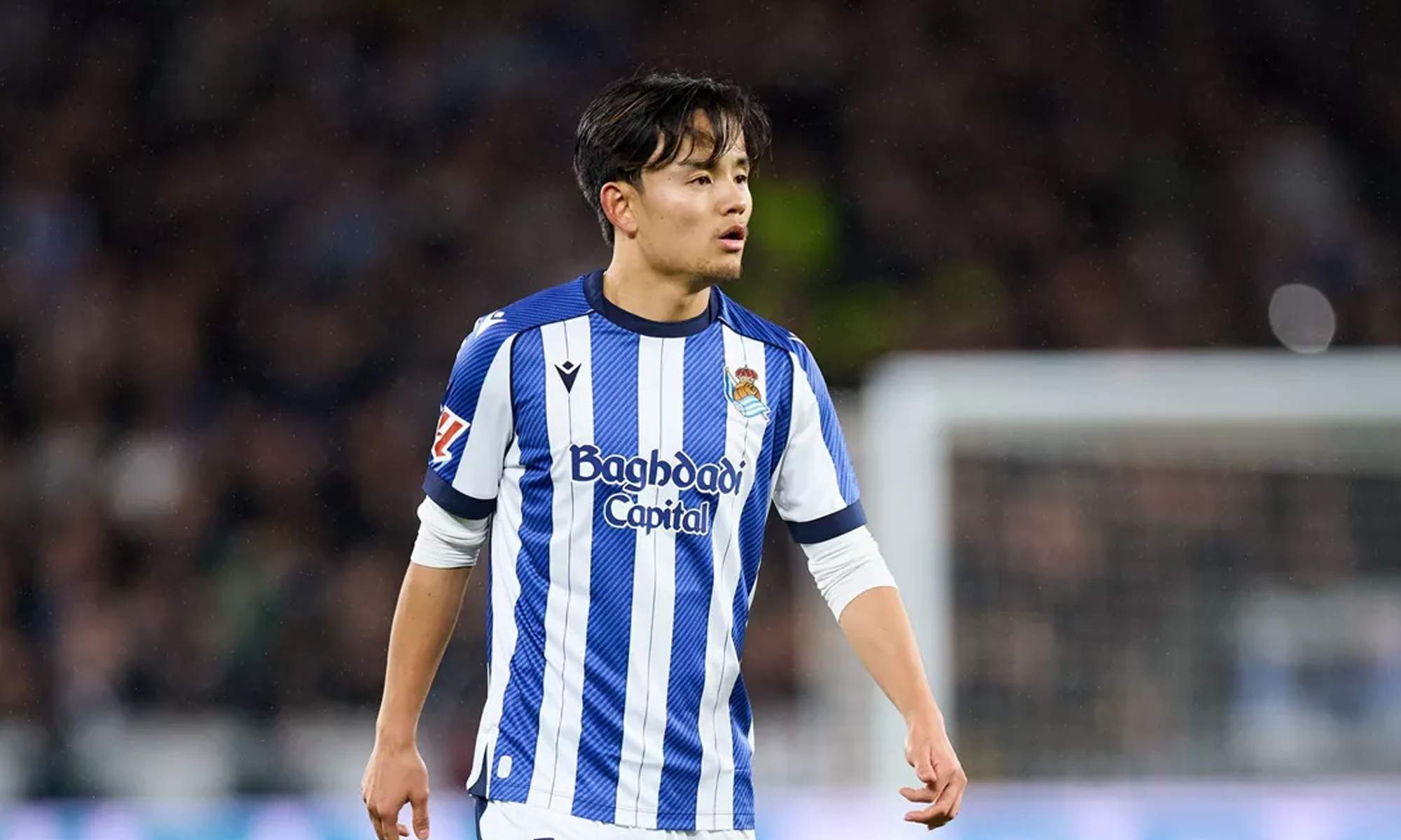 Take Kubo jugando un partido con la Real Sociedad.