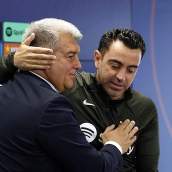 Joan Laporta y Xavi Hernández.