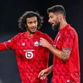 Bouaddi y Giroud durante un partido con el Lille. 